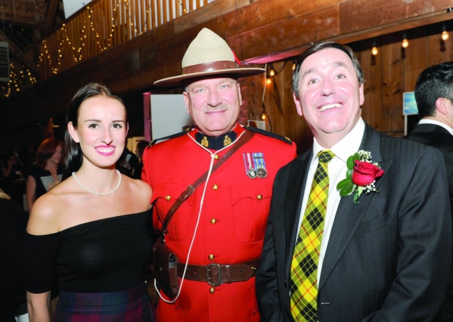 Evann Bush, RCMP Const. Terry Russel and Kriss Bush